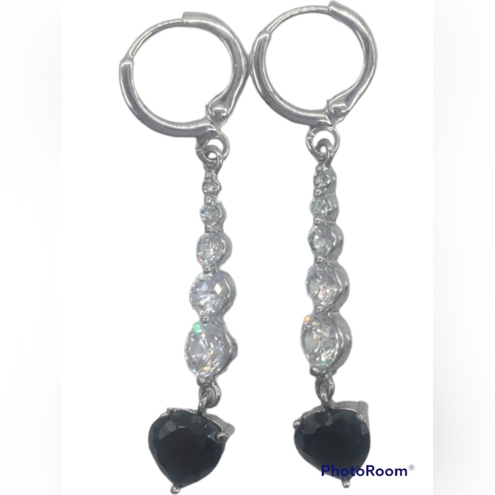 Silver toned drop earrings with black heart shaped and 5 round white rhinestones